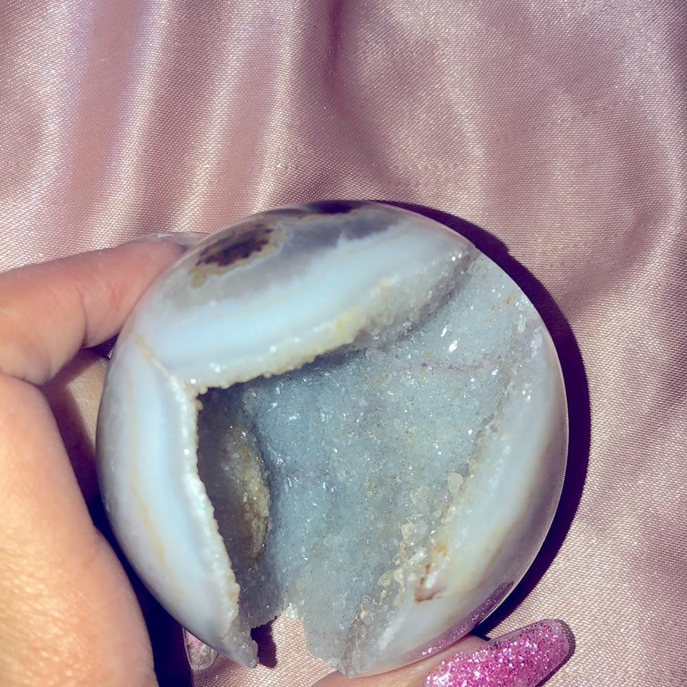 Agate sphere with eye banding and druzy in the mouth